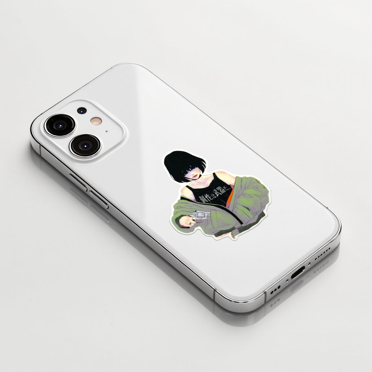 Individuality is a Weapon ✦ B-Side Label Sticker on a white iPhone