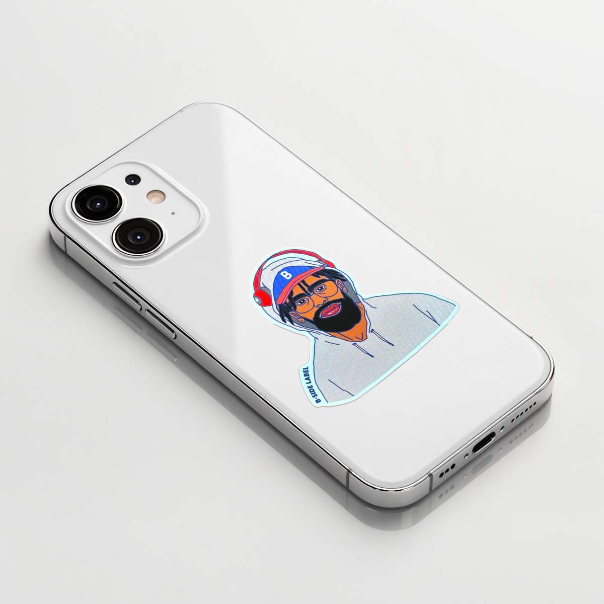 Hoodie, Beard, Ball Cap ✦ B-Side Label Sticker on a white iPhone