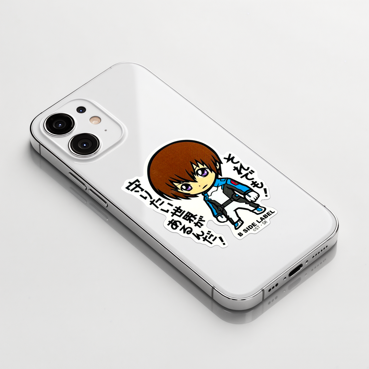 Gundam SEED Kira ✦ B-Side Label Sticker on a white iPhone
