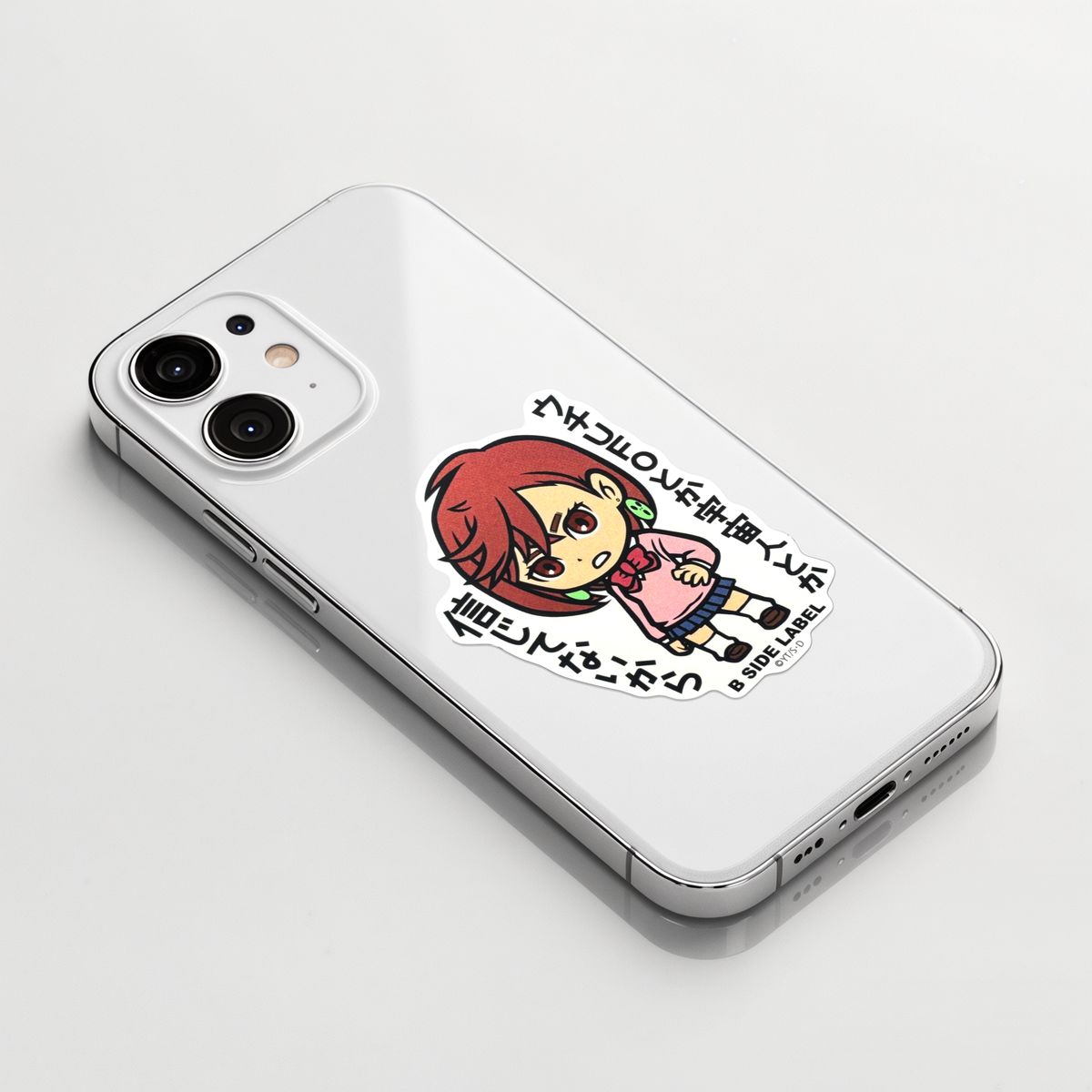 DanDaDan Momo ✦ B-Side Label Sticker on a white iPhone