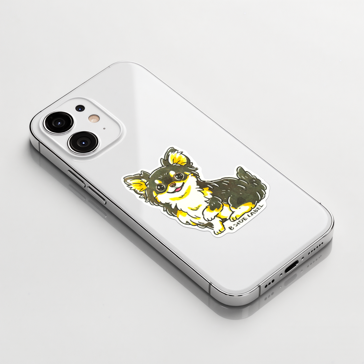 Cute Chihuahua ✦ B-Side Label Sticker on a white iPhone