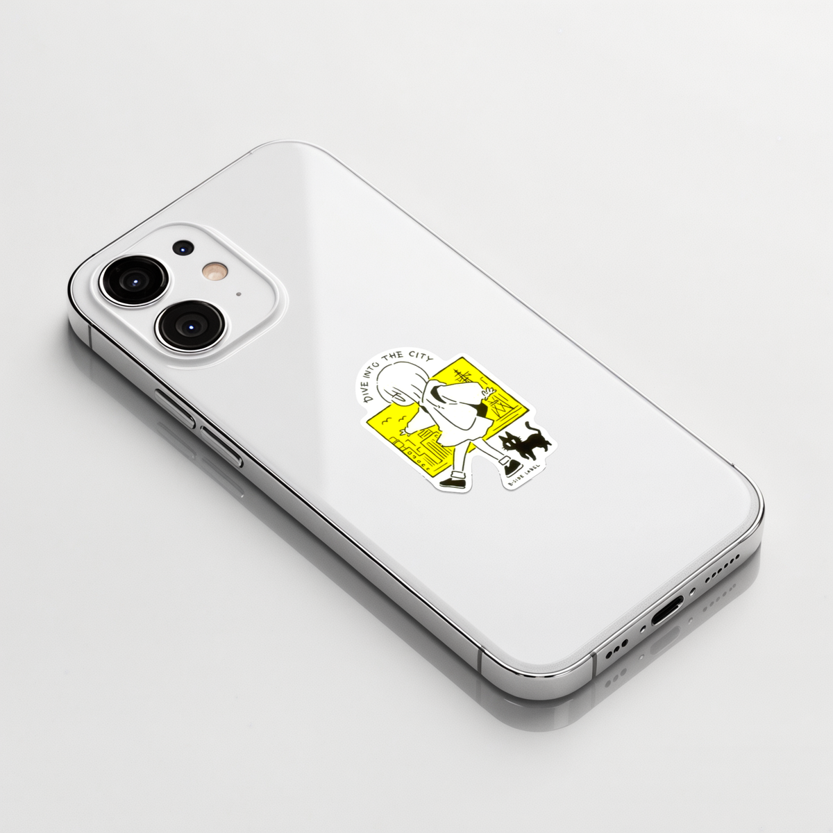 Cute Girl & Cat Walking ✦ B-Side Label Sticker on a white iPhone