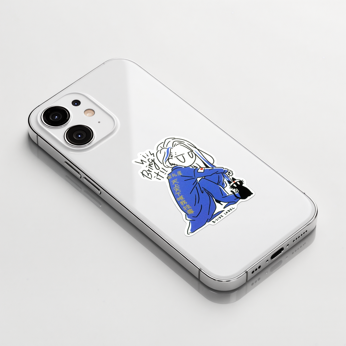 Biker Gang Girl & Kitten ✦ B-Side Label Sticker on a white iPhone