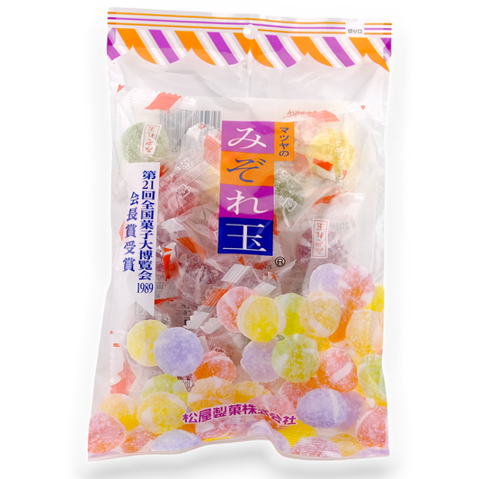 Packaged gummy candies with colorful design on a white background