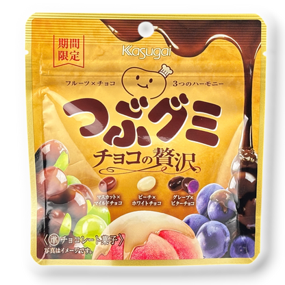 Kasugai candy package with colorful gummy candies on a white background