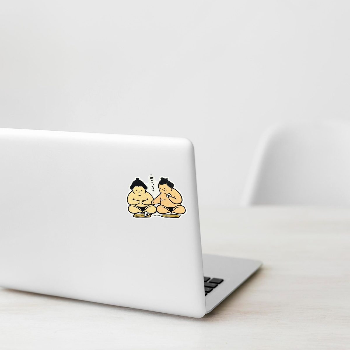 Sumo Wrestlers Sharing Rice Balls  ✦ B-Side Label Sticker shown on a white laptop; illustrative placement, not to scale.