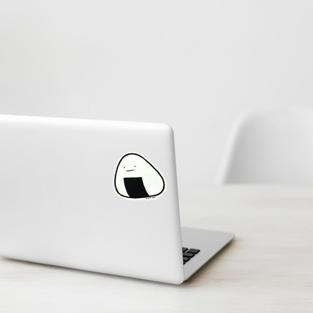 Cute Riceball Onigiri ✦ B-Side Label Sticker shown on a white laptop; illustrative placement, not to scale.