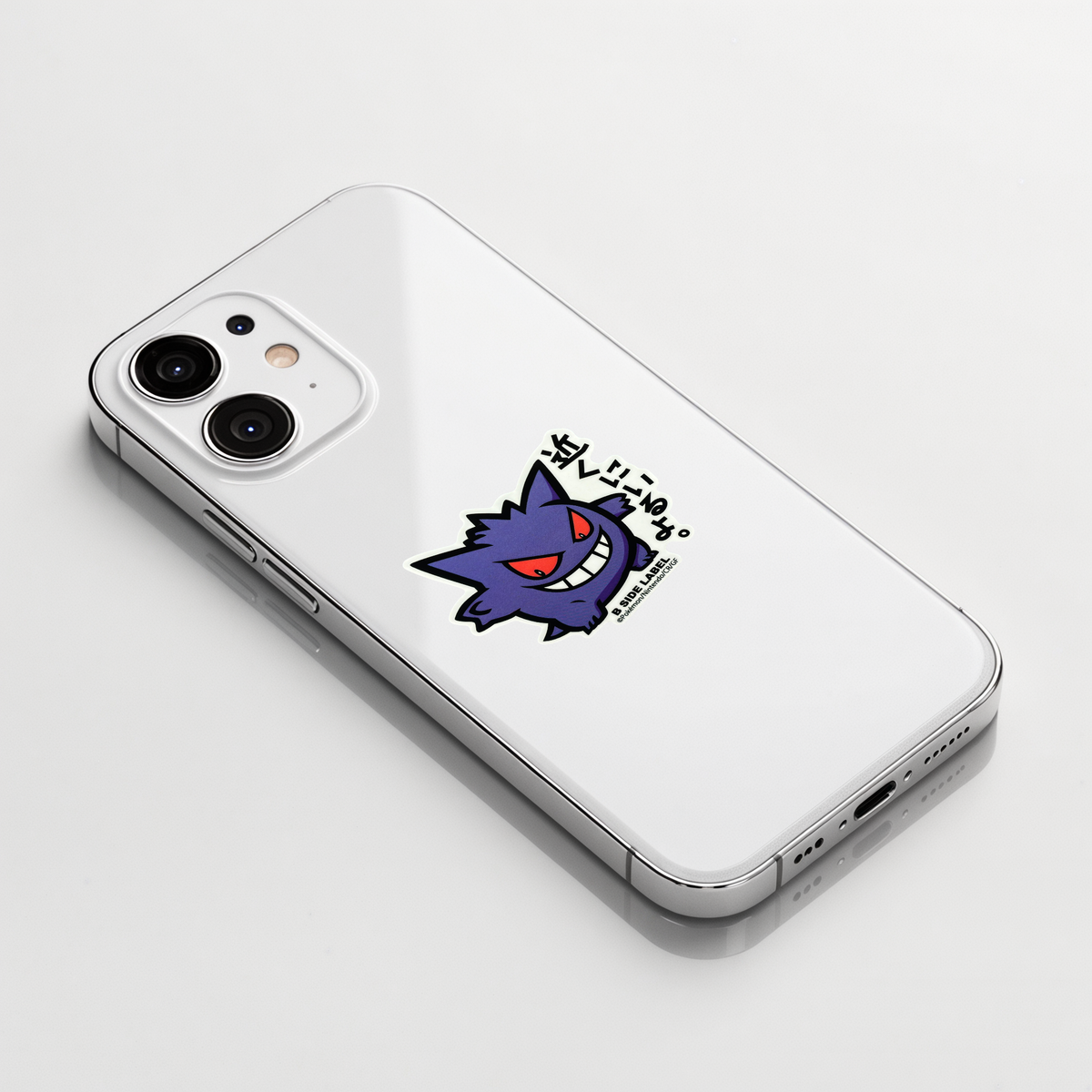 Pokémon Gengar ✦ B-Side Label Sticker shown on a white iPhone; illustrative placement, not to scale.