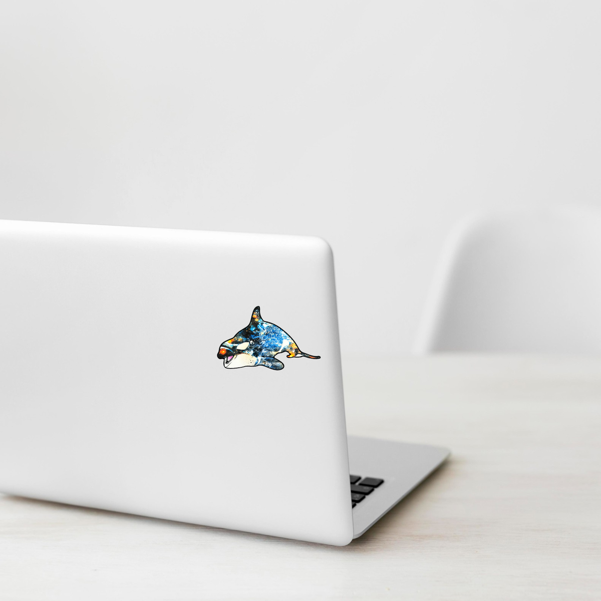 Colorful Orca Killer Whale ✦ B-Side Label Sticker shown on a white laptop; illustrative placement, not to scale.