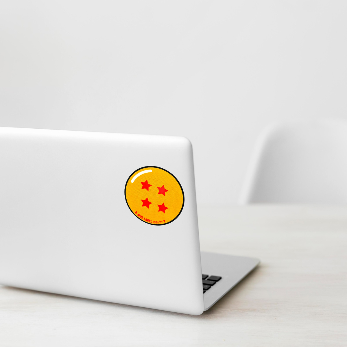 Dragon Ball Z - Four-Star Ball ✦ B-Side Label Sticker shown on a white laptop; illustrative placement, not to scale.