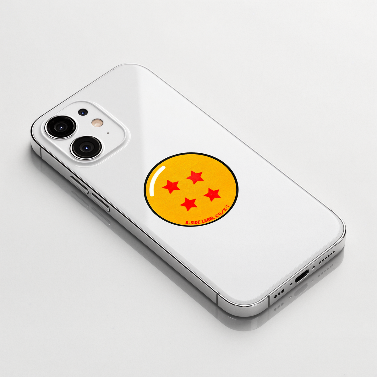 Dragon Ball Z - Four-Star Ball ✦ B-Side Label Sticker shown on a white iPhone; illustrative placement, not to scale.
