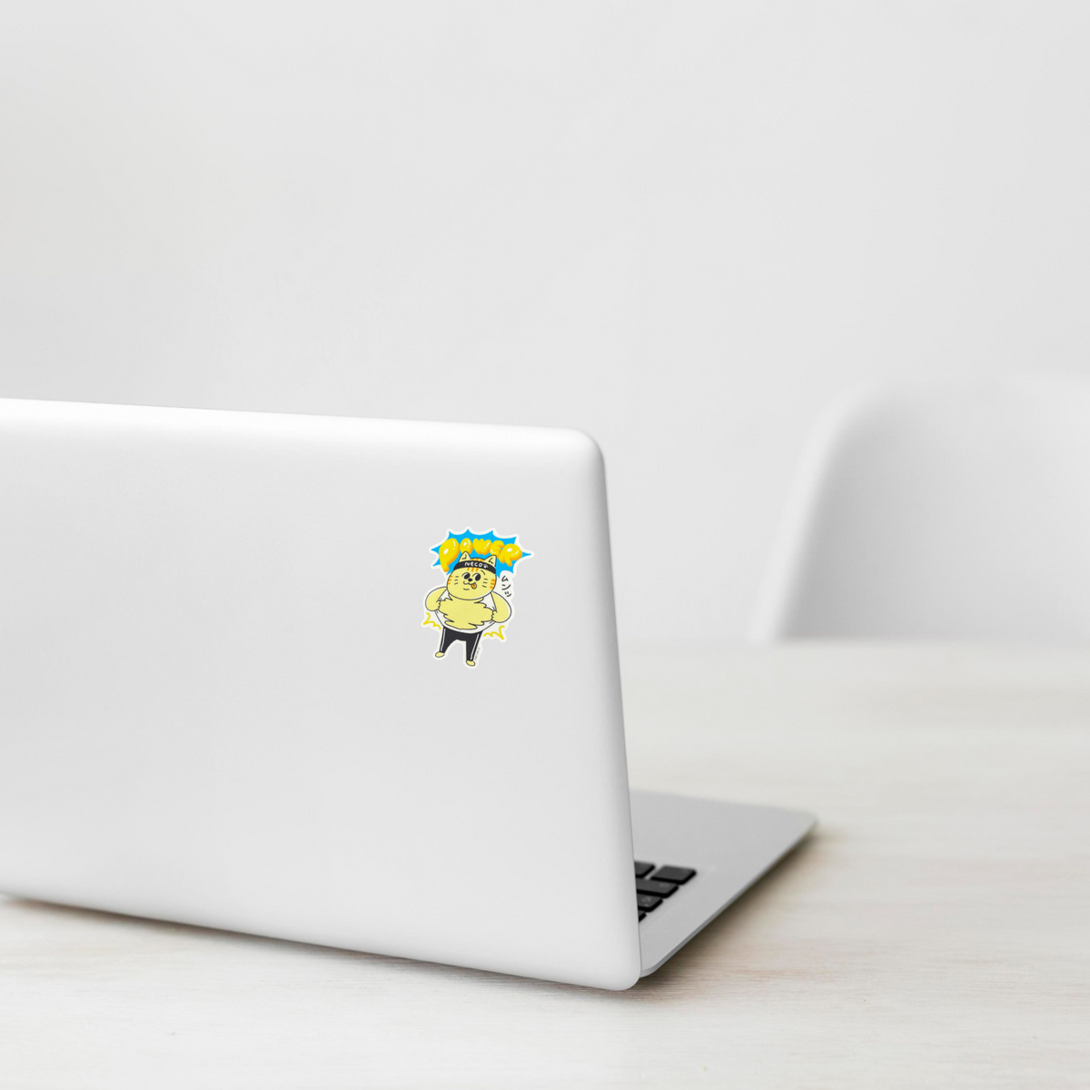 Muscle Kitten Ripping T-Shirt ✦ B-Side Label Sticker on white laptop — Shopify Medium PhotoRoom template, orientation corrected from verified original photograph