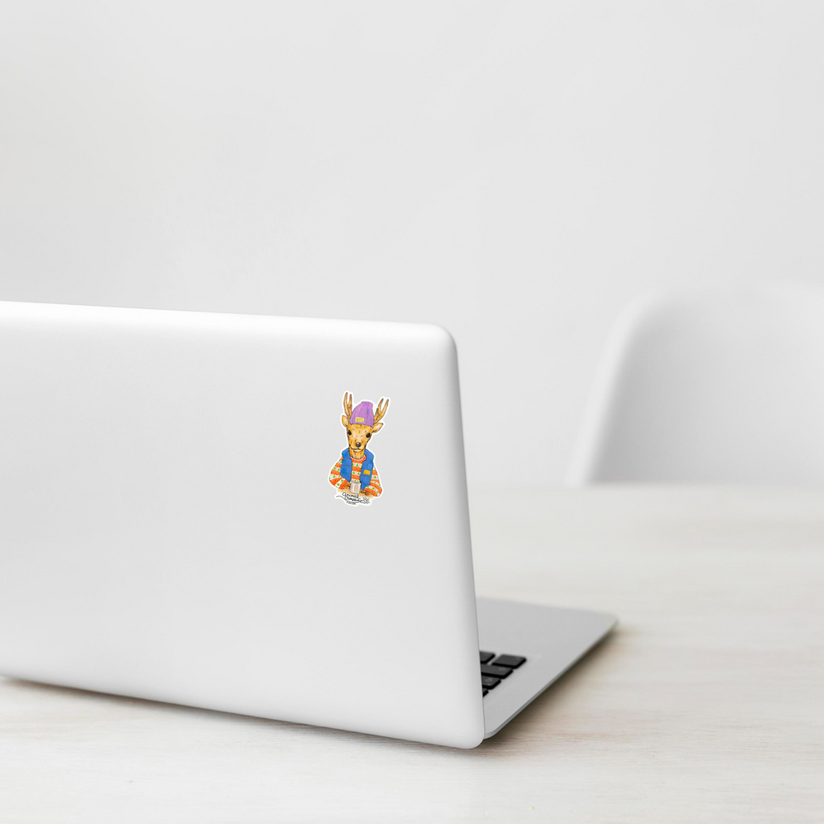 Cute Deer Camper in Vest ✦ B-Side Label Sticker on white laptop — Shopify Medium PhotoRoom template, orientation corrected from verified original photograph