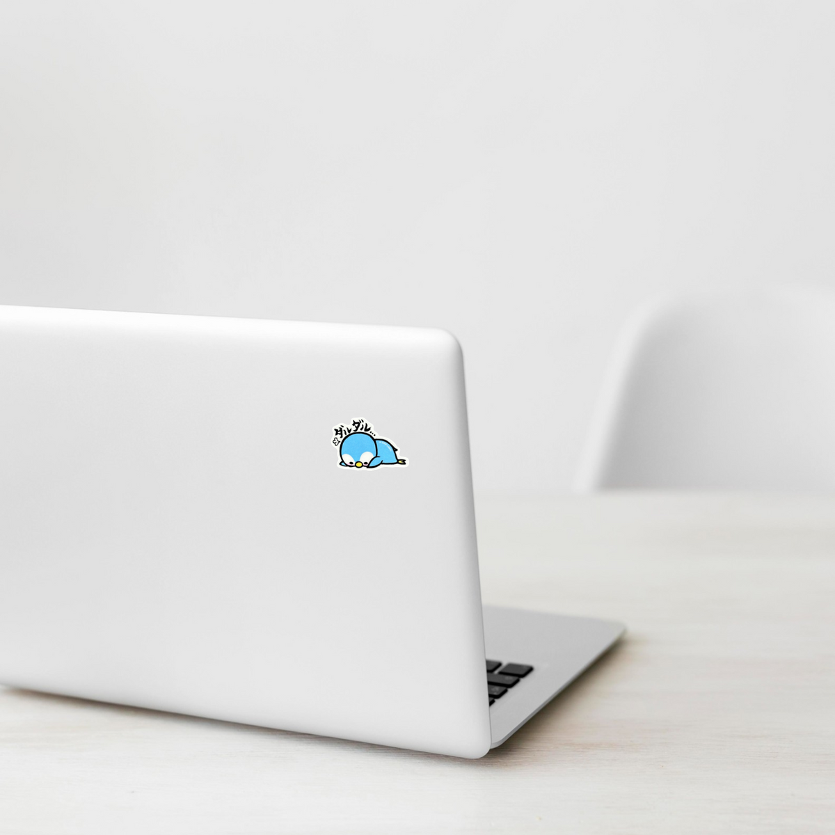 Exhausted Baby Penguin on laptop — verified original photo, Shopify Small PhotoRoom template