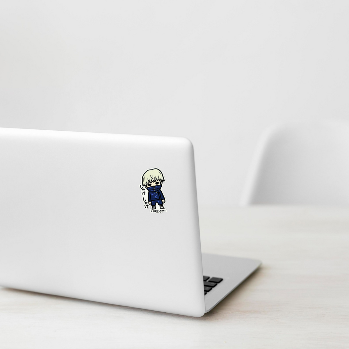 Jujutsu Kaisen Toge Inumaki  ✦ B-Side Label Sticker on a white laptop — Shopify template, original photograph