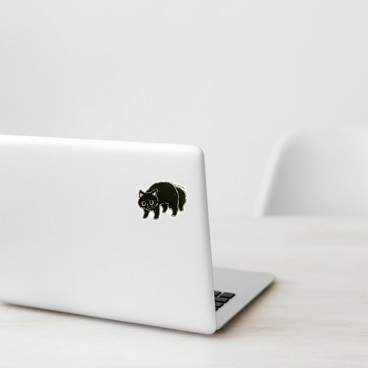 Nervous Black Cat ✦ B-Side Label Sticker — laptop scene using the Shopify PhotoRoom template and original photograph