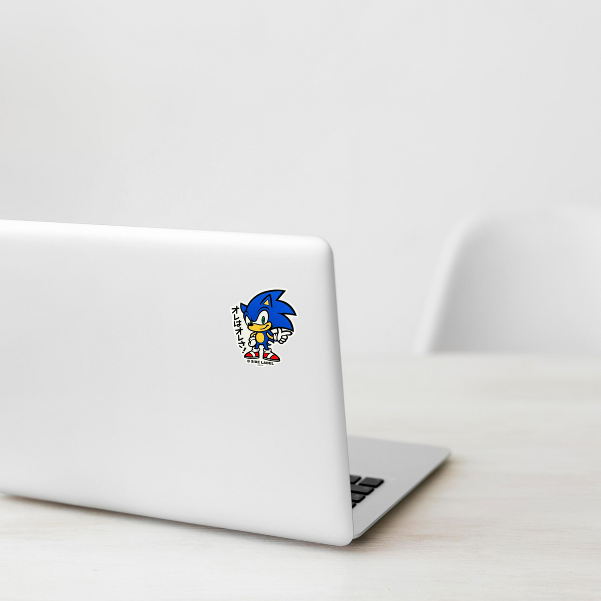 Sonic The Hedgehog - Sonic (Me) ✦ B-Side Label Sticker on a white laptop — Shopify template, original photograph