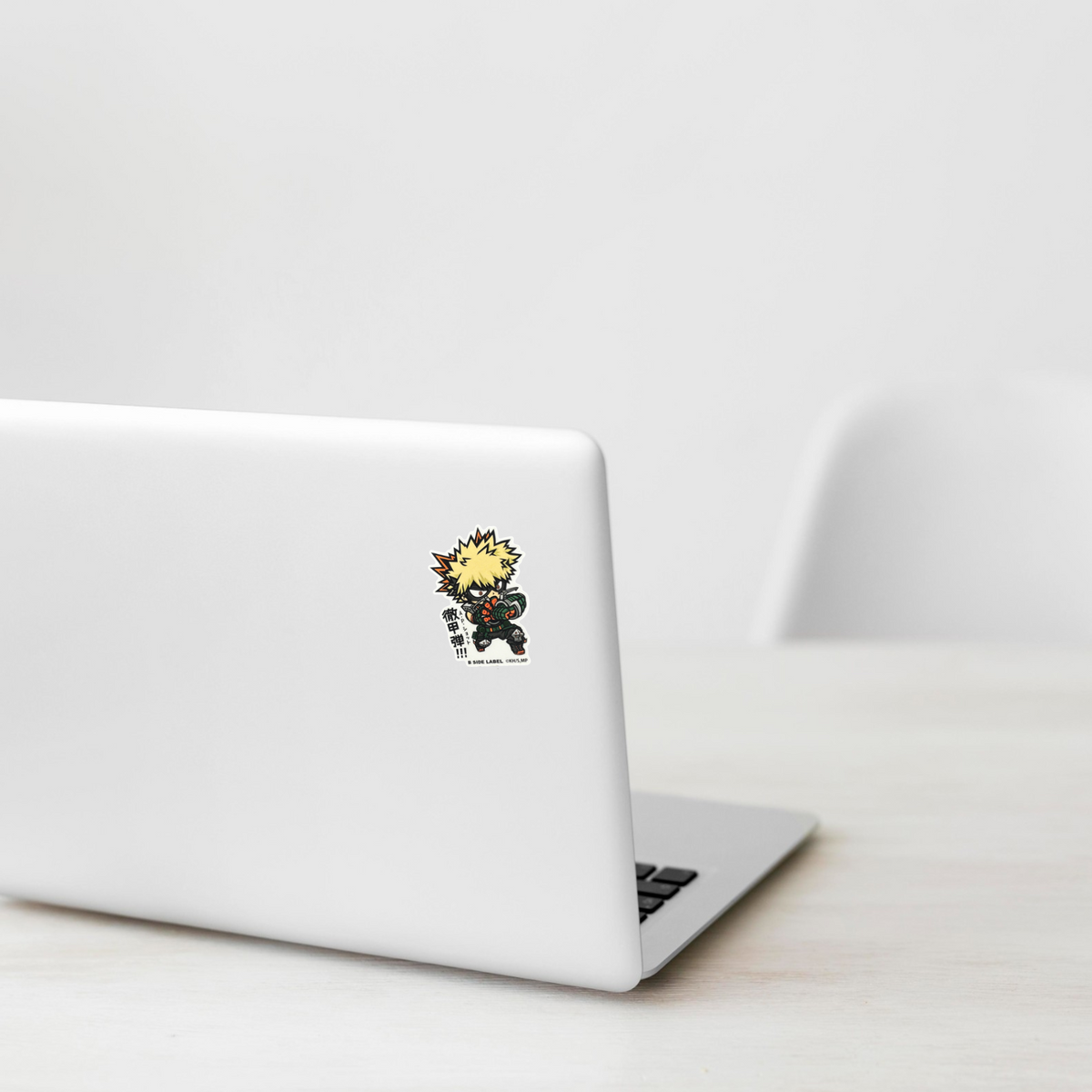 My Hero Academia Bakugo Katsuki AP Shot ✦ B-Side Label Sticker on laptop — Shopify Medium template, original photograph, mask corrected in PhotoRoom