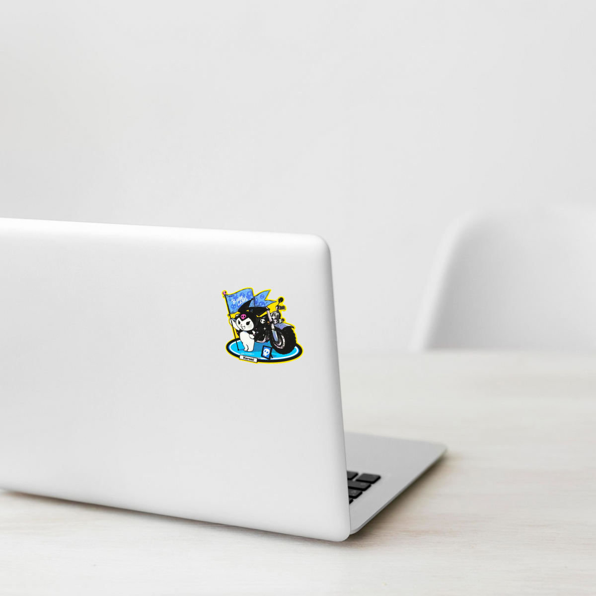 Sanrio Kuromi Rebel Biker Girl  ✦ B-Side Label Sticker on a white laptop — Shopify template, original photograph