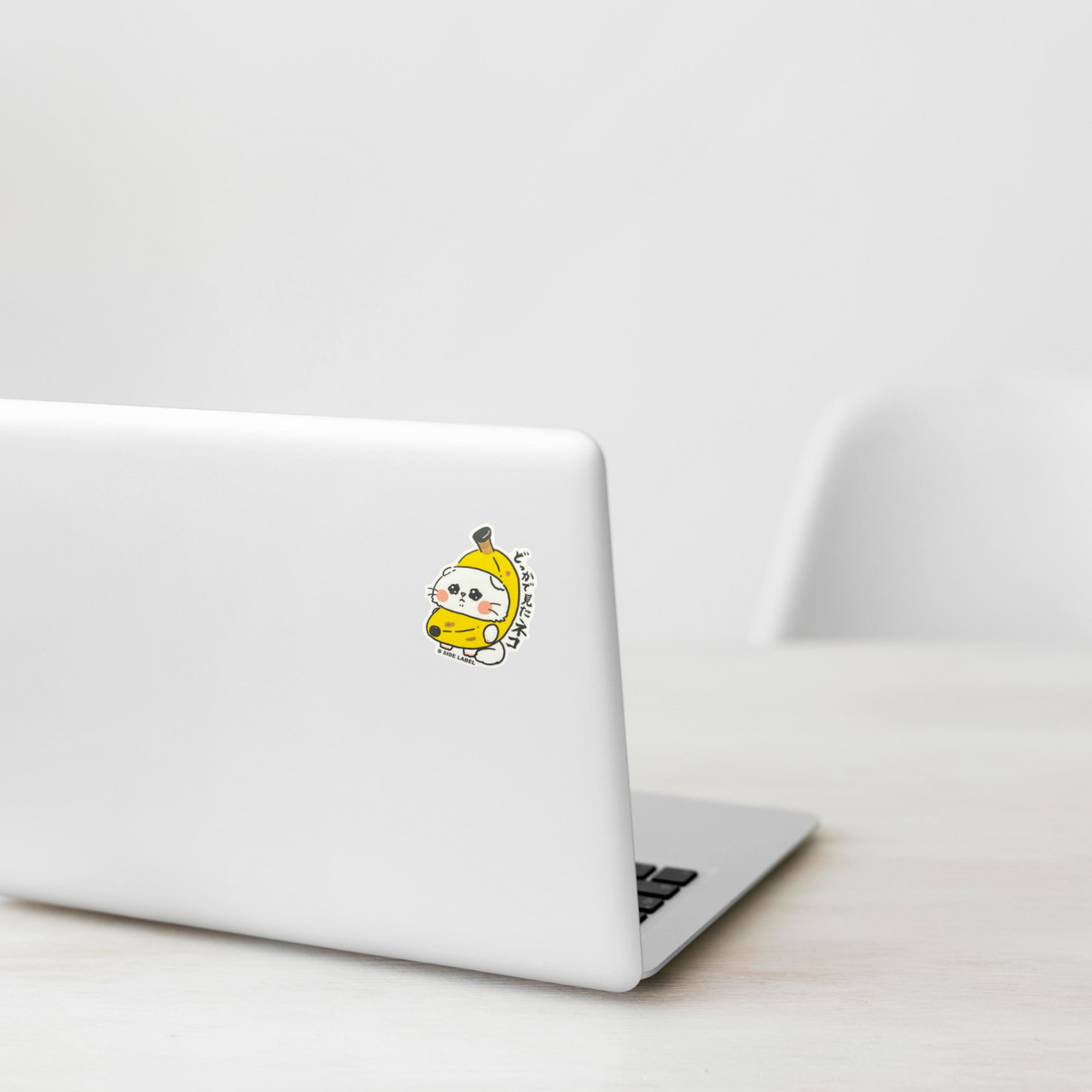 Cute Kitten Banana Costume ✦ B-Side Label Sticker — laptop scene using the Shopify PhotoRoom template and original photograph