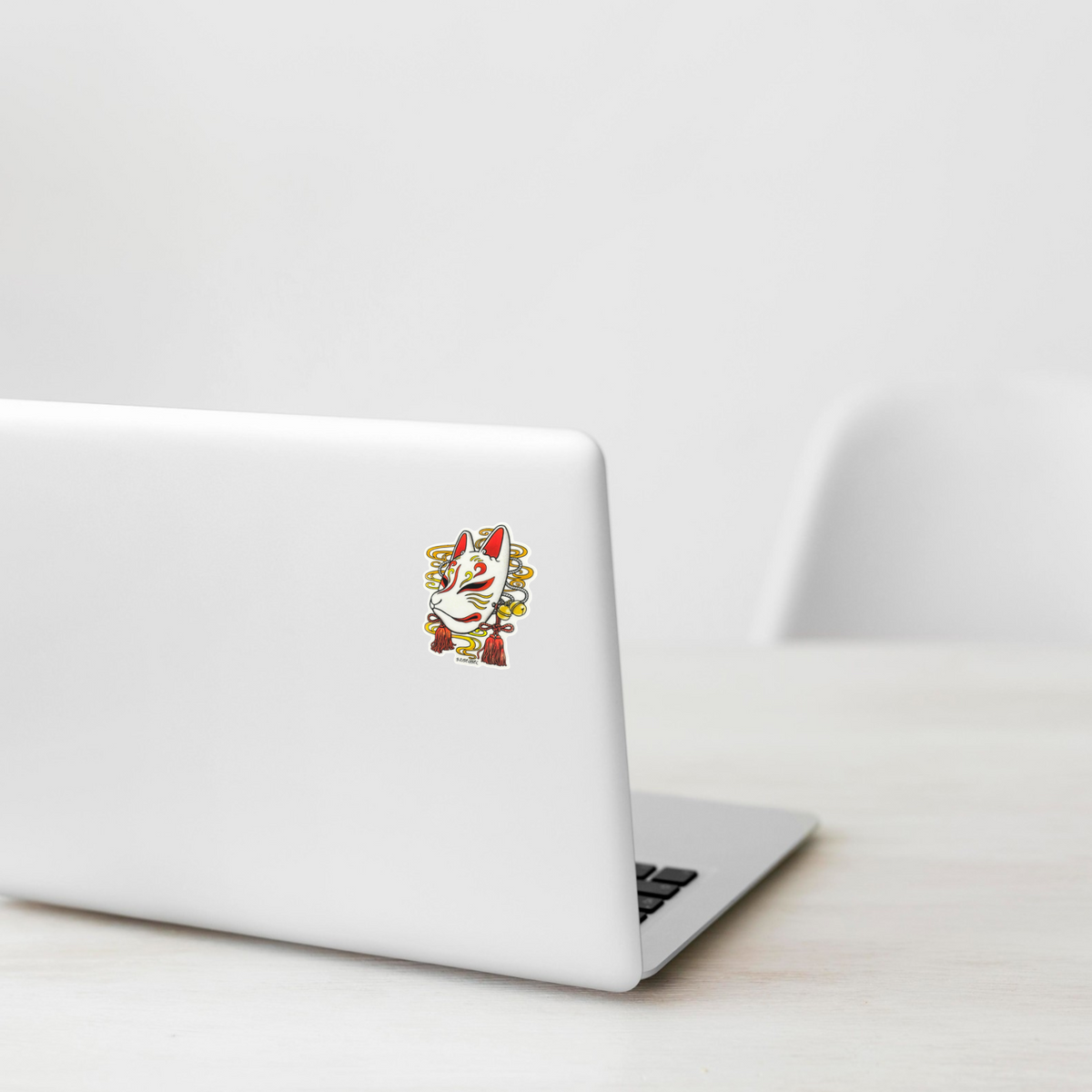 Japanese Fox Mask ✦ B-Side Label Sticker on a white laptop — Shopify template, original photograph