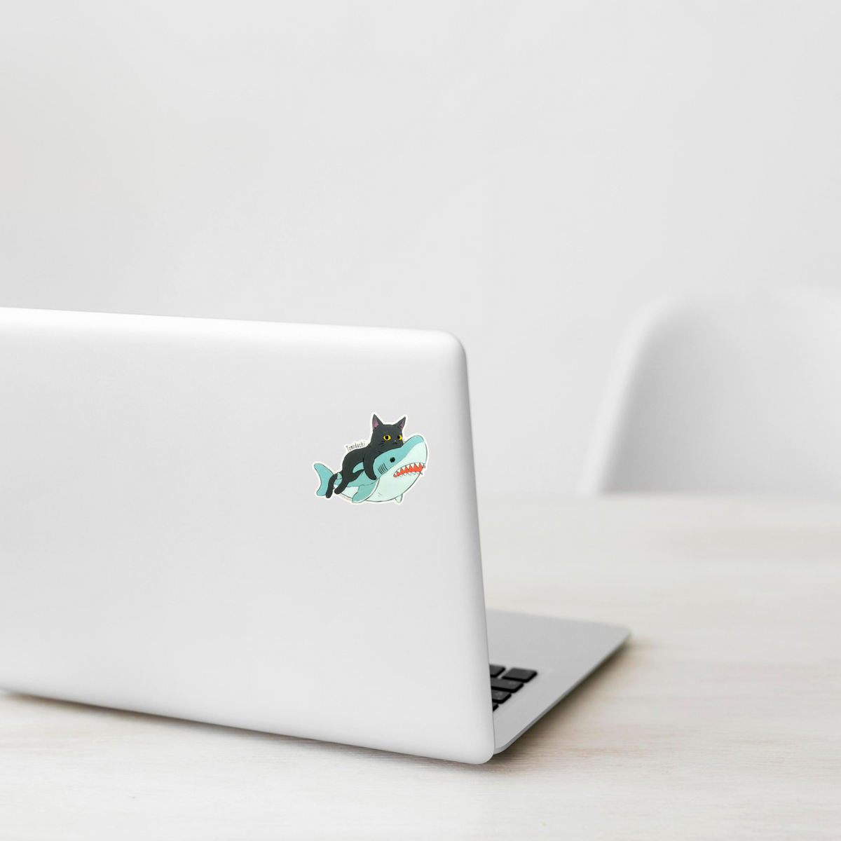 Cat & Shark... Friends ✦ B-Side Label Sticker on a white laptop — Shopify template, original photograph