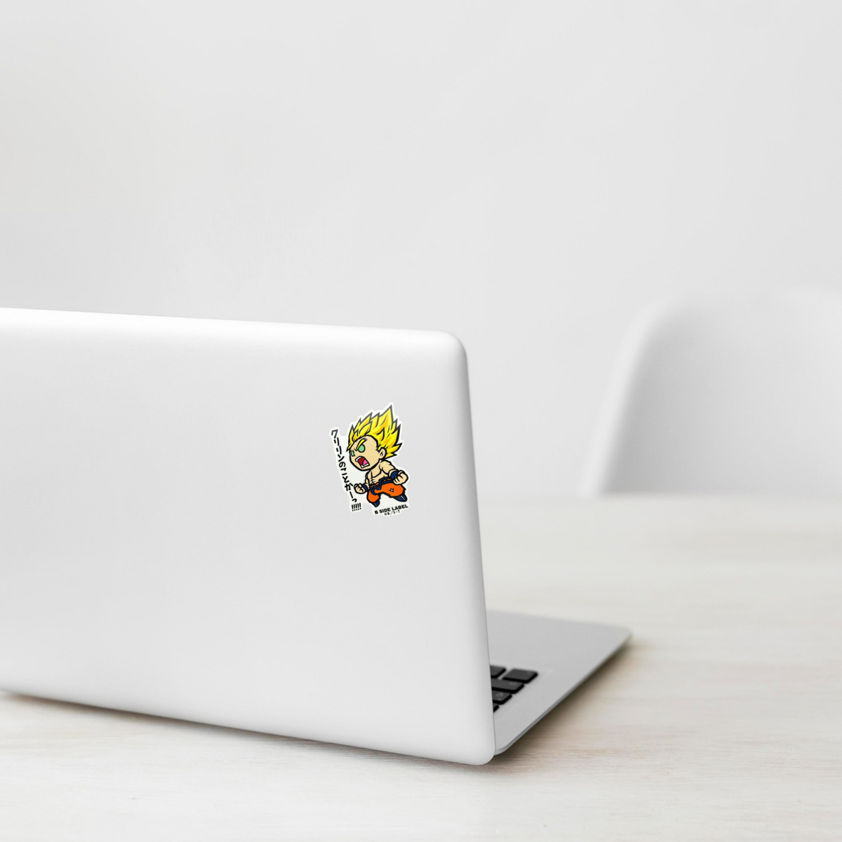 Dragon Ball Z - SS Goku ✦ B-Side Label Sticker on a white laptop — Shopify template, original photograph