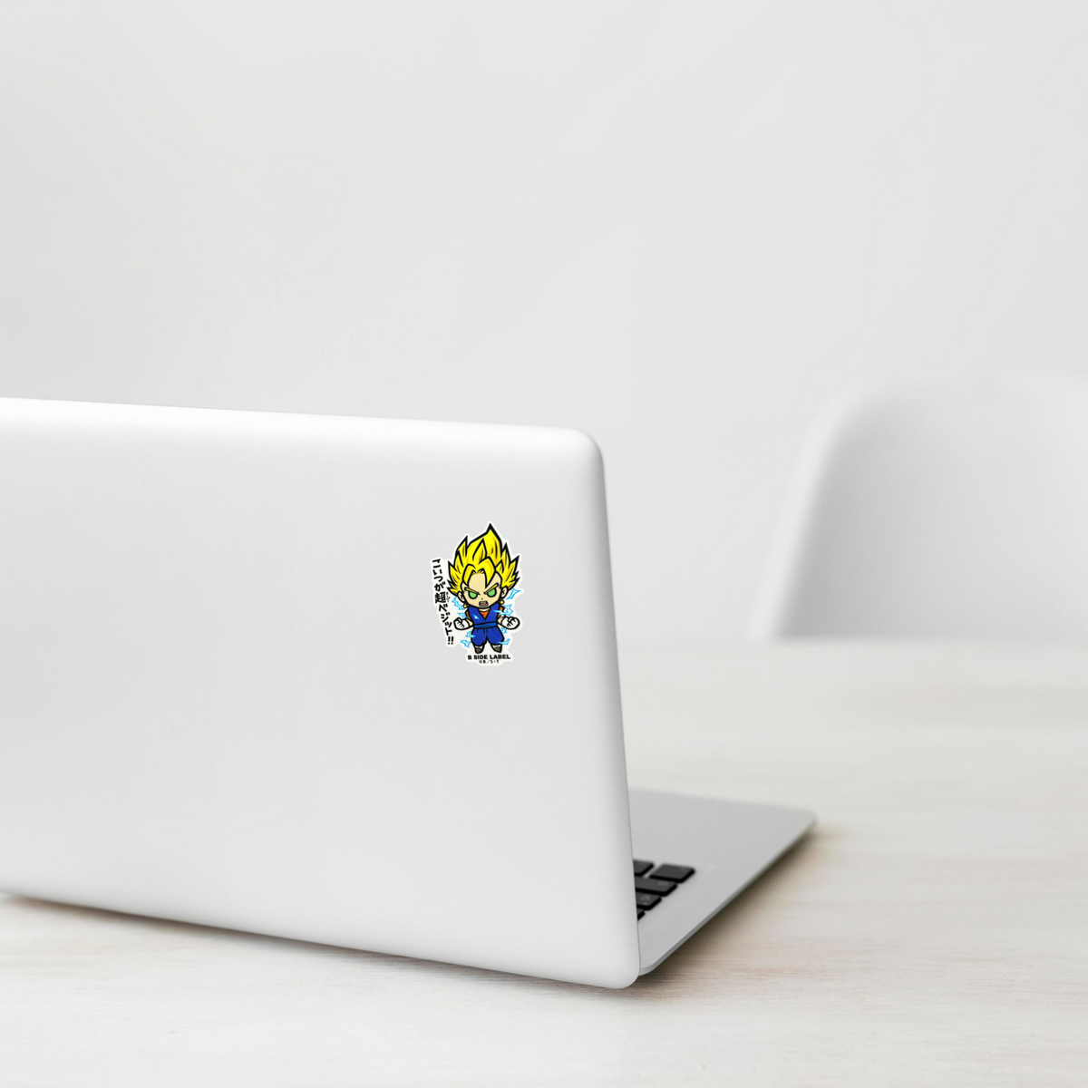 Dragon Ball Z - Vegito ✦ B-Side Label Sticker on a white laptop — Shopify template, original photograph