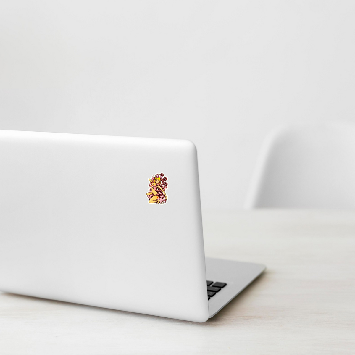 Pink Ribbon Raijin ✦ B-Side Label Sticker on a white laptop — Shopify Small template, original photograph