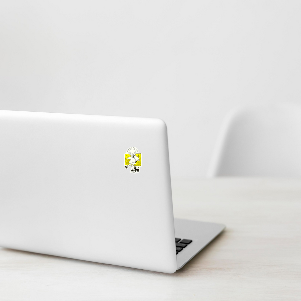 Cute Girl & Cat Walking ✦ B-Side Label Sticker on a white laptop — Shopify Small template, original photograph